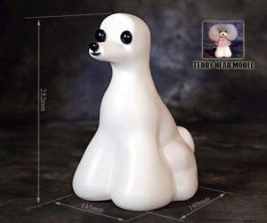 Teddy Model Dog. Seated position Great for displaying your work. Wigs are purchased seperatly and come in a variety of color options. Wigs can be cut and designed to show off your scissoring and coloring skills. 